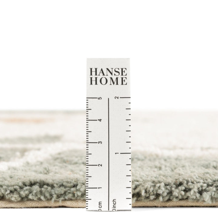 Hanse Home rug with a measurement scale on a white background