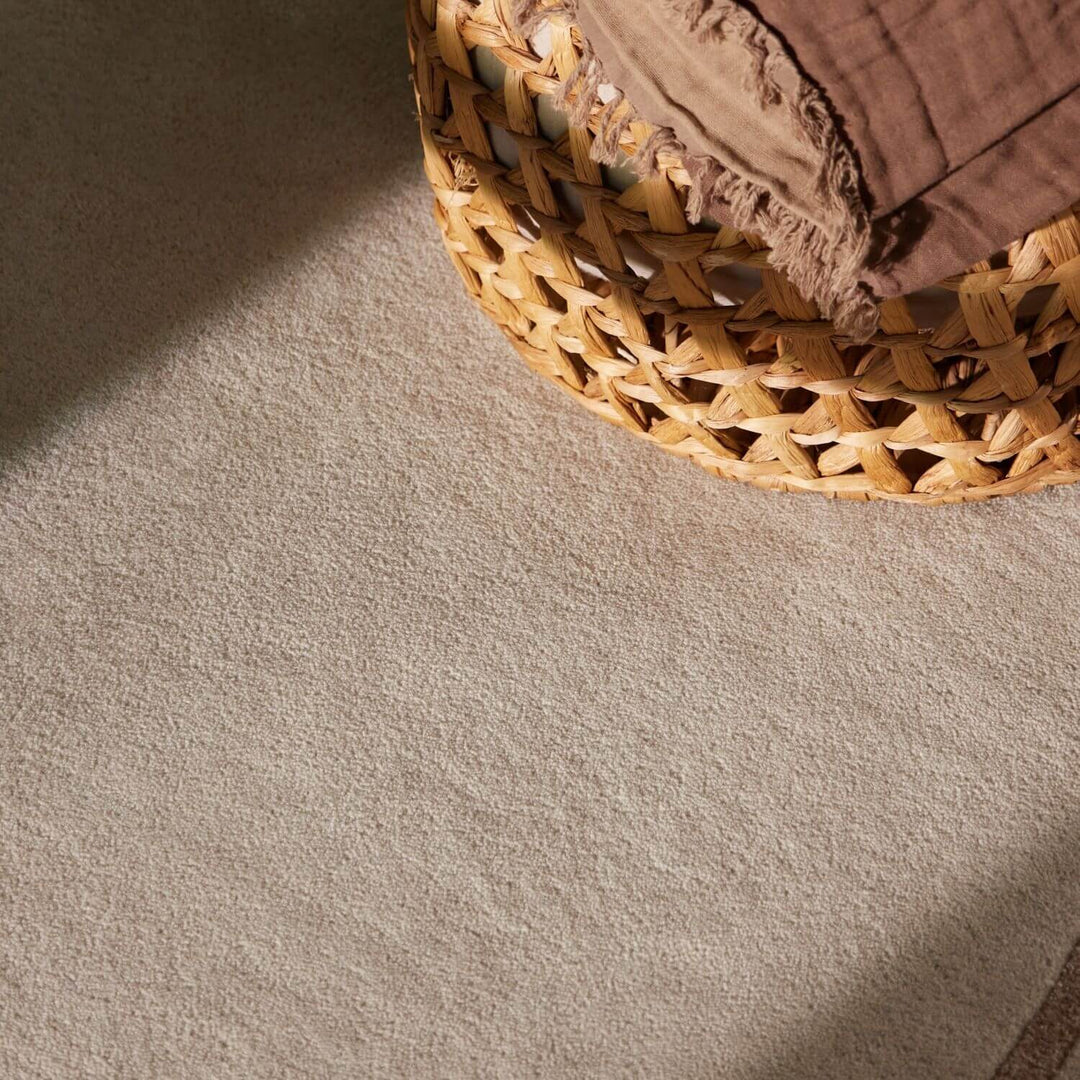 Pure wool rug, cream beige colours, cotton backing, cosy warmth, hand-crafted.