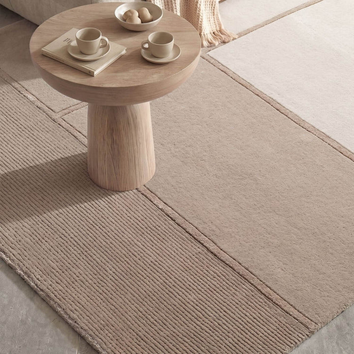 Pure wool rug, cream beige colours, cotton backing, cosy warmth, hand-crafted.