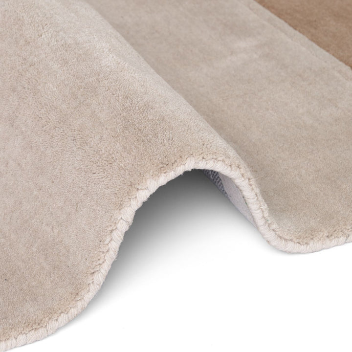 Pure wool rug, cream brown colours, soft durable pile, cotton backing, simple care, ideal for busy homes.