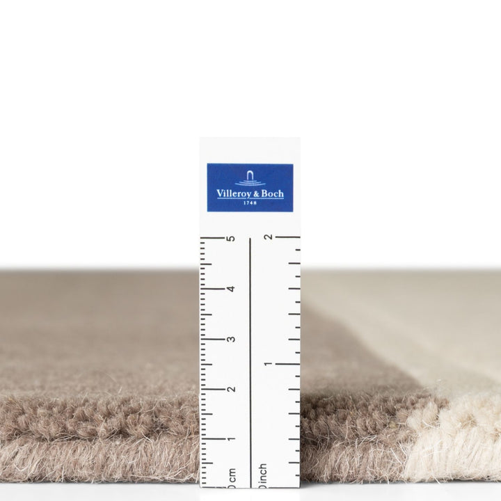 Pure wool rug, cream brown colours, soft durable pile, cotton backing, simple care, ideal for busy homes.