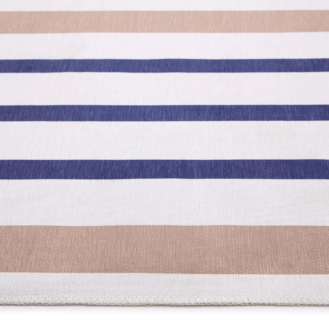 Close-up of a fabric with horizontal stripes in beige, white, and blue.