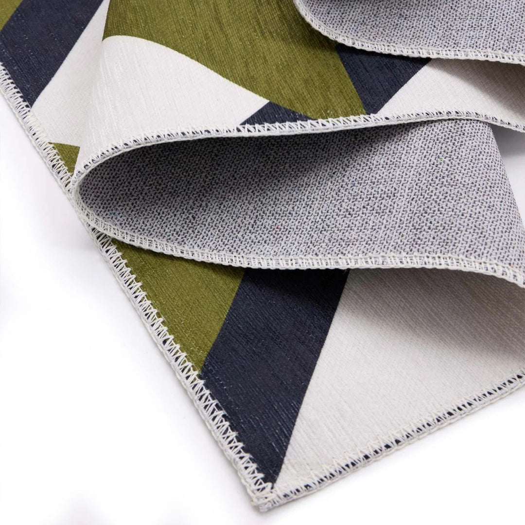 Fabric swatches in green, navy, gray, and white on a white background