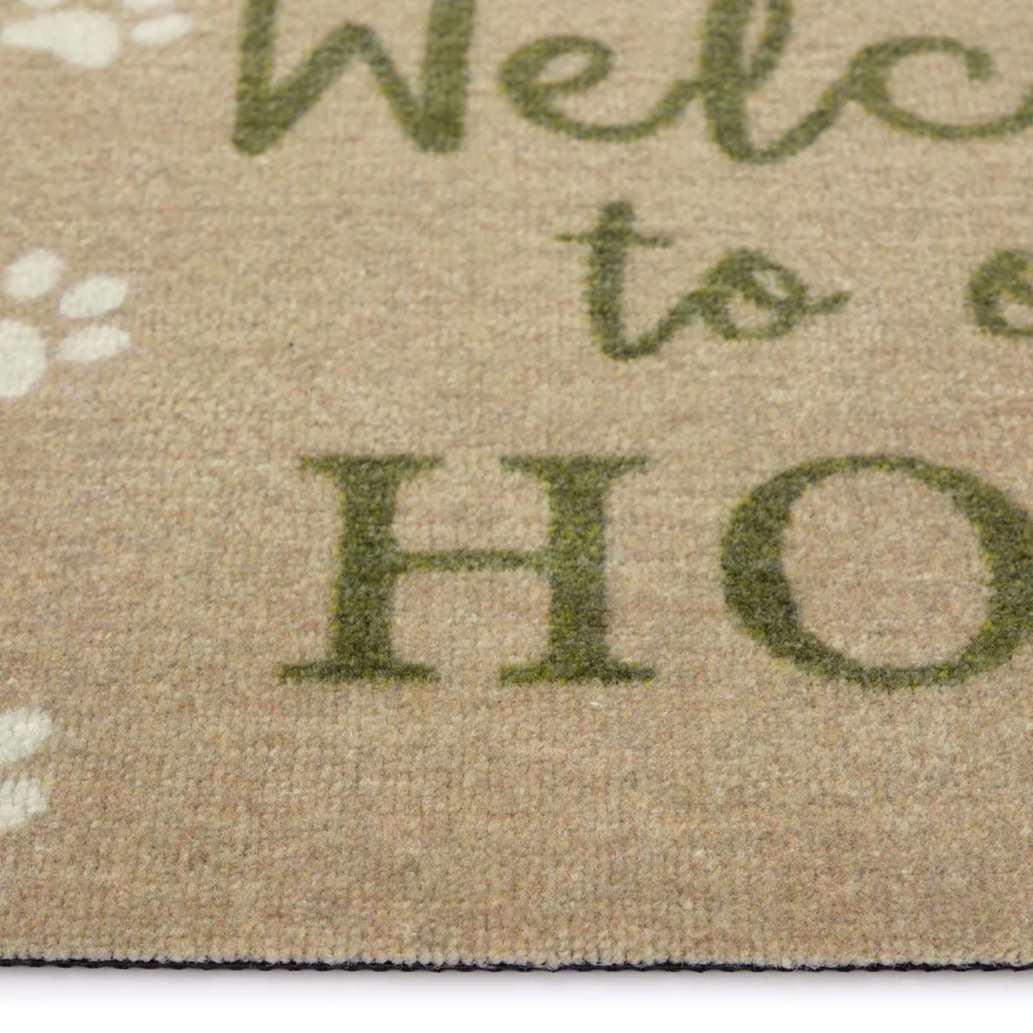 Doormat with 'Welcome to our Home' text and paw prints on a beige background