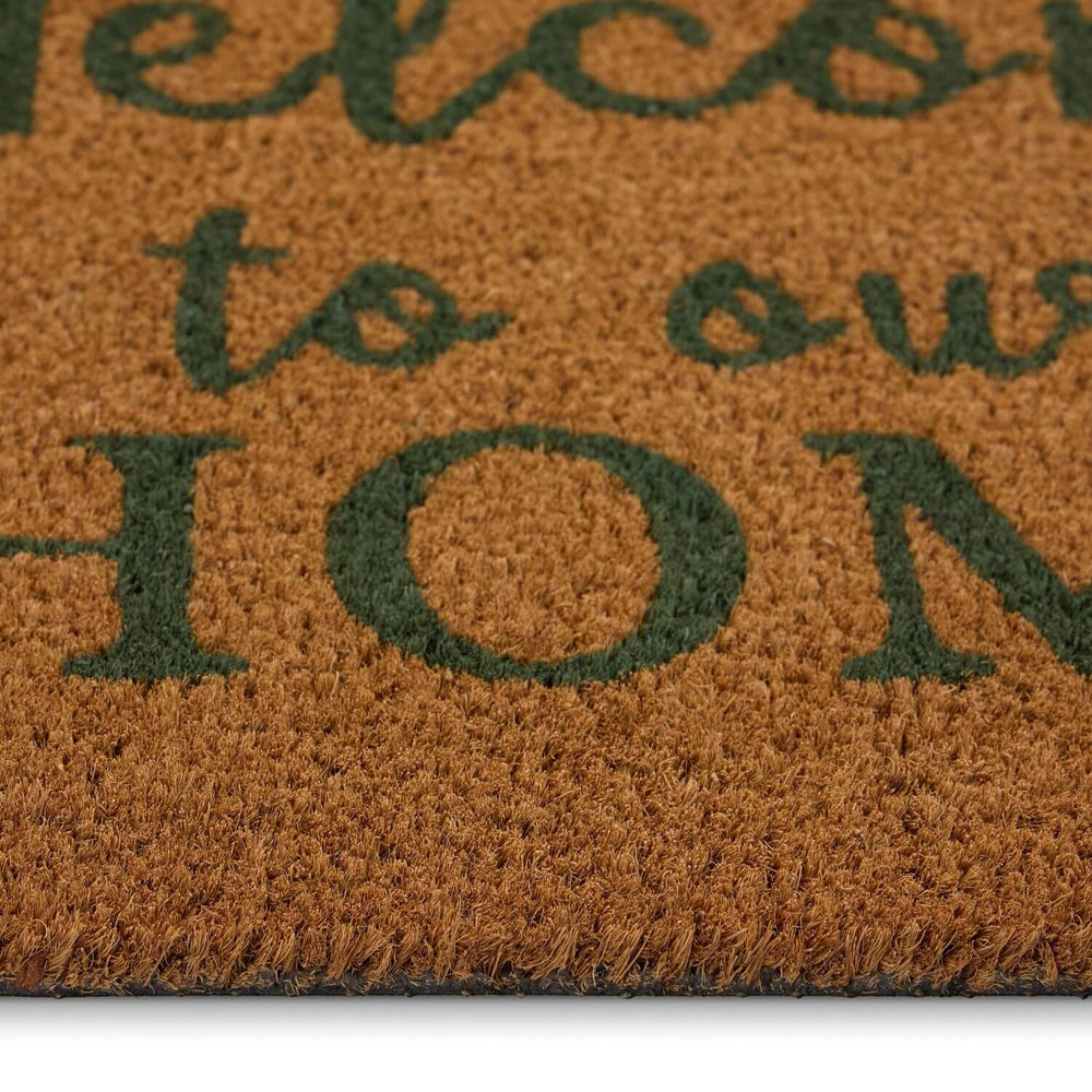 Doormat with 'Welcome to our Home' text on a brown background