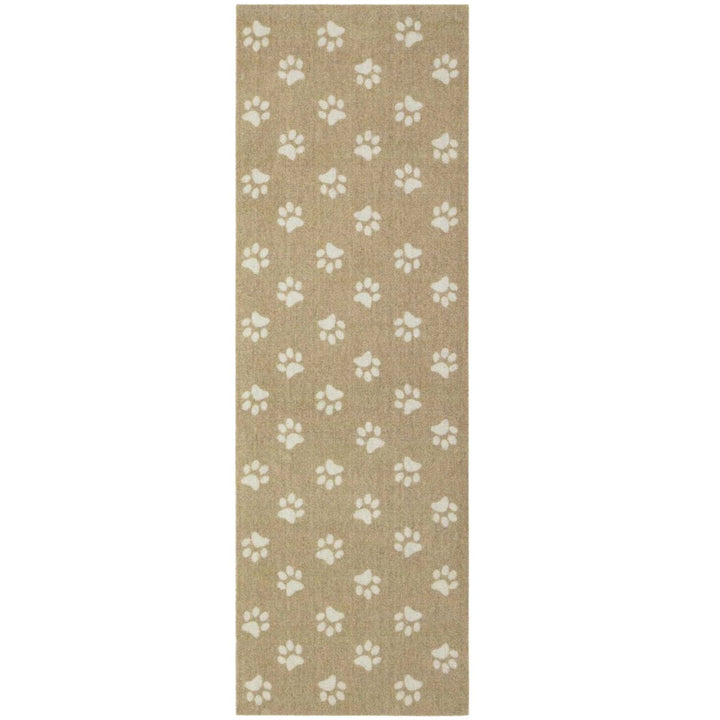 Beige rug with white paw print pattern on a plain background