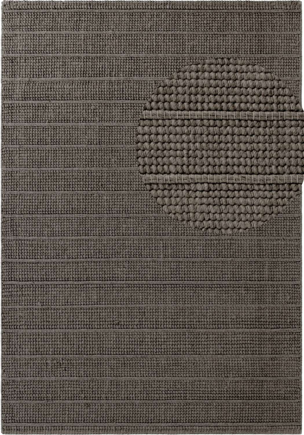 Textured brown rug with a circular pattern