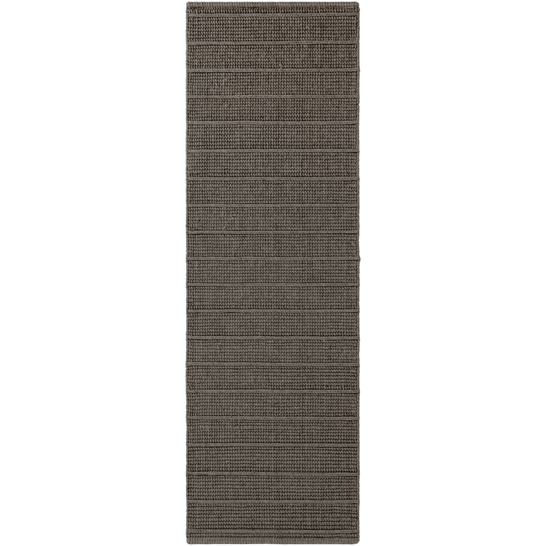 Dark gray woven runner rug on a white background