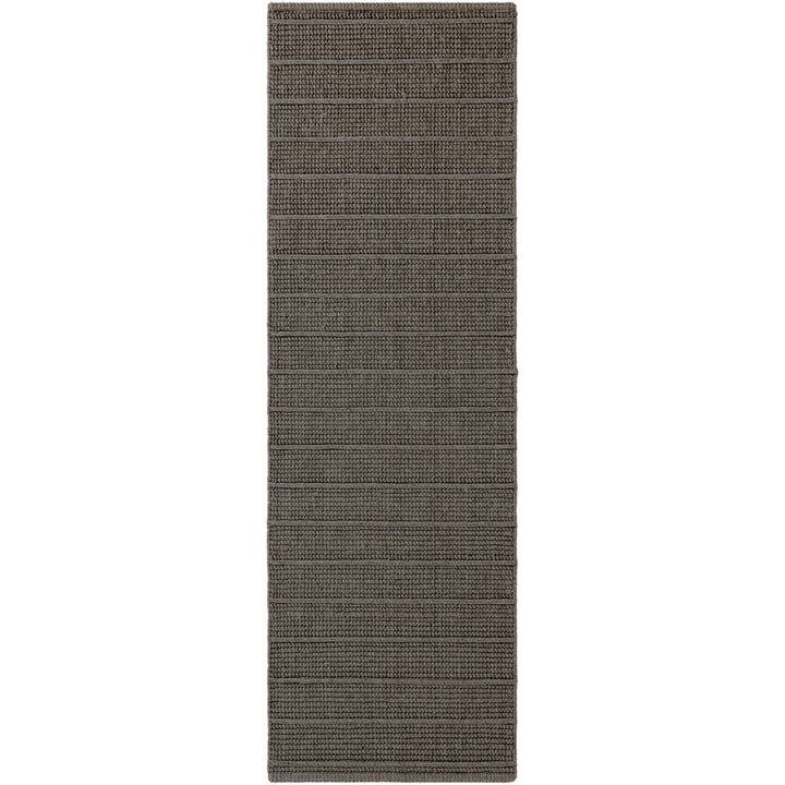 Dark gray woven runner rug on a white background