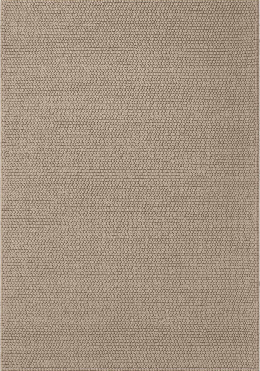 Beige textured fabric pattern