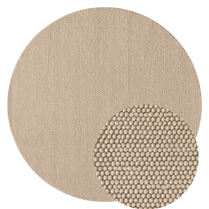 Two circular textured mats with different surface patterns on a white background