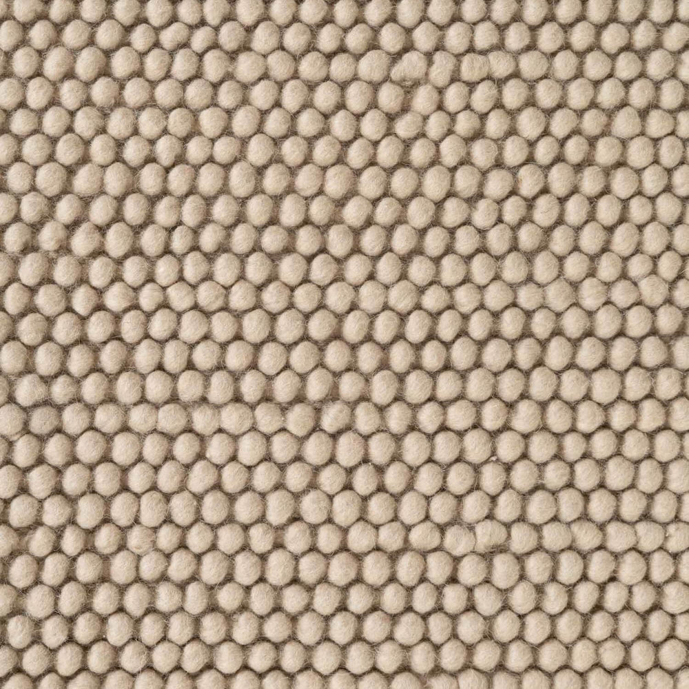 Textured beige fabric pattern