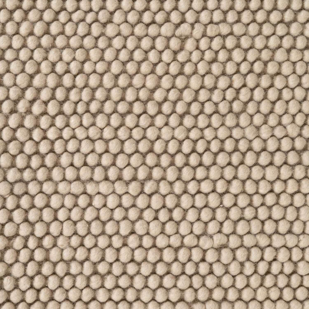 Textured beige fabric pattern