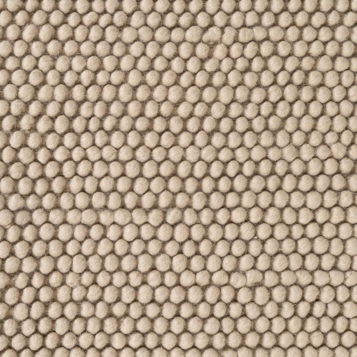 Textured beige fabric pattern