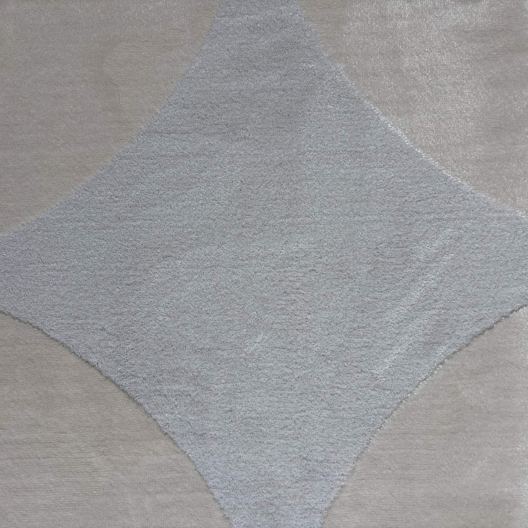 Gray diamond pattern on a textured surface