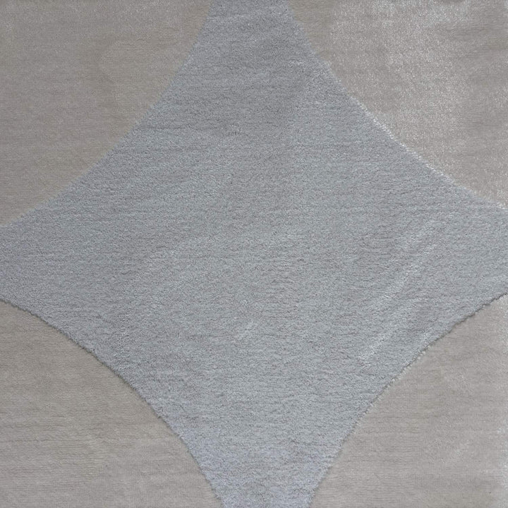Gray diamond pattern on a textured surface