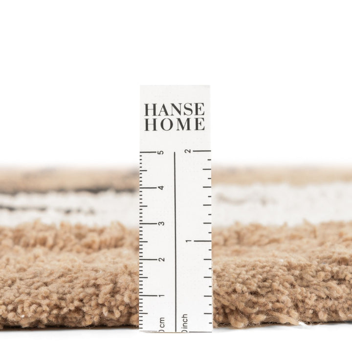 Textured fabric sample with a ruler and &