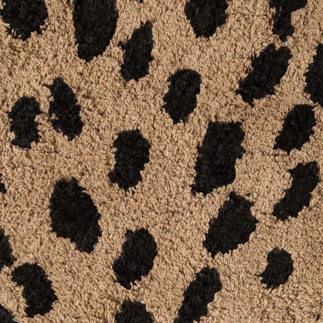 Textured surface with black and brown pattern