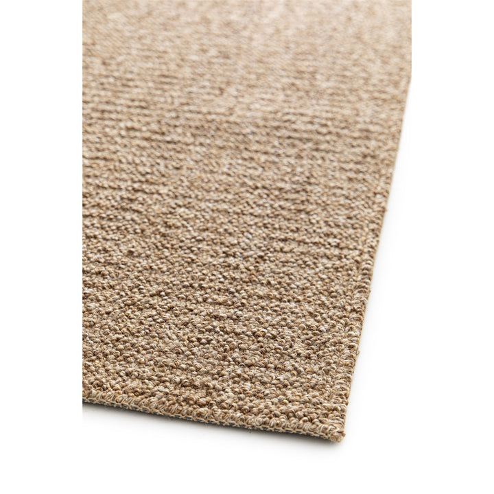 Dune Boucle beige textured rug, close-up of the bound edge | The Rugs