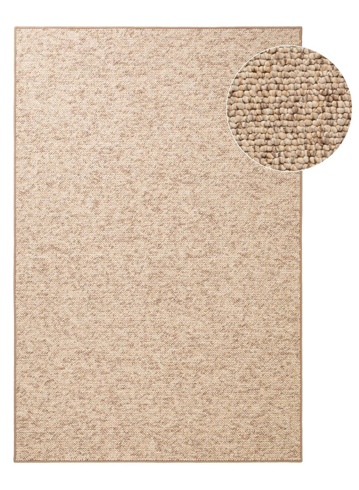 Beige textured rug with a close-up detail on a white background