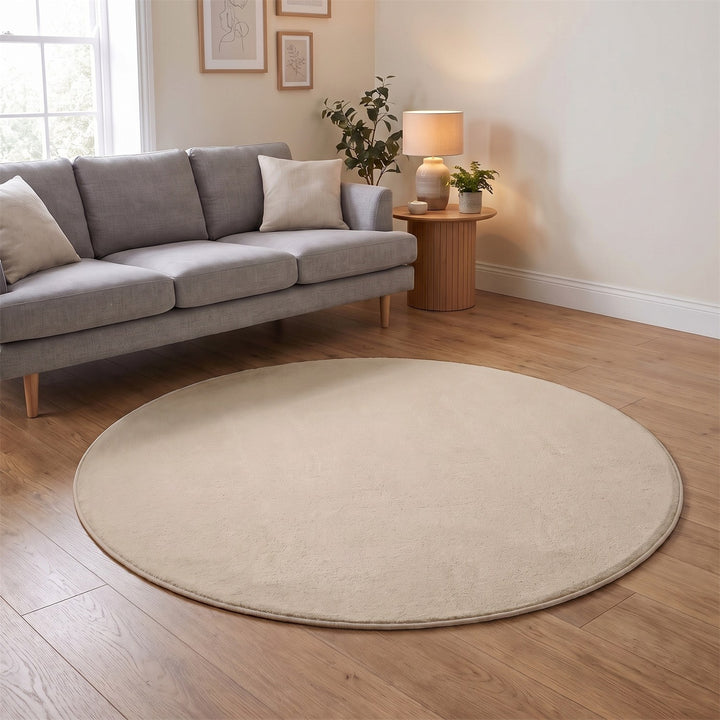 Washmellow beige round washable rug in a living room | The Rugs