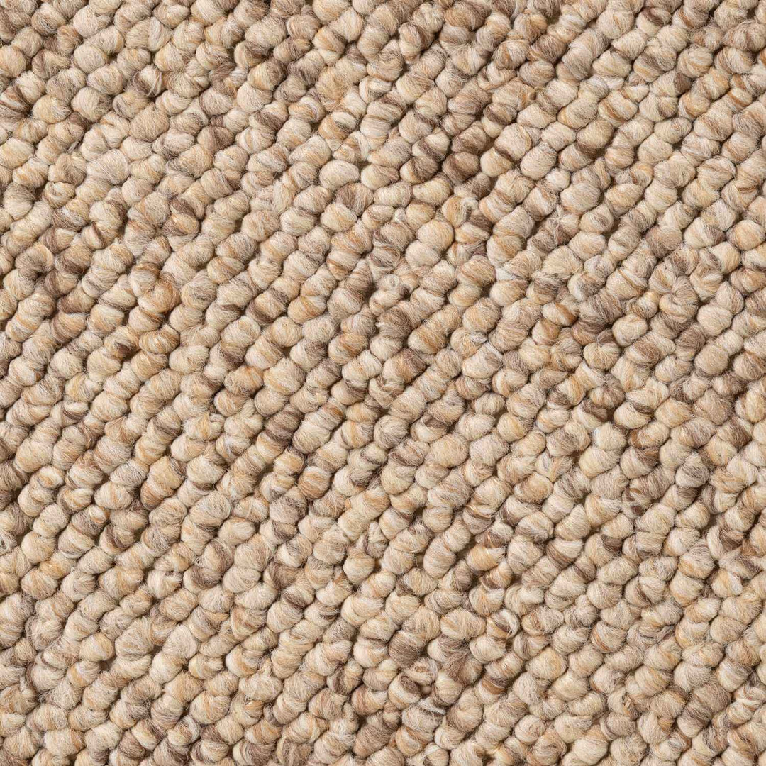 Close-up of beige textured carpet