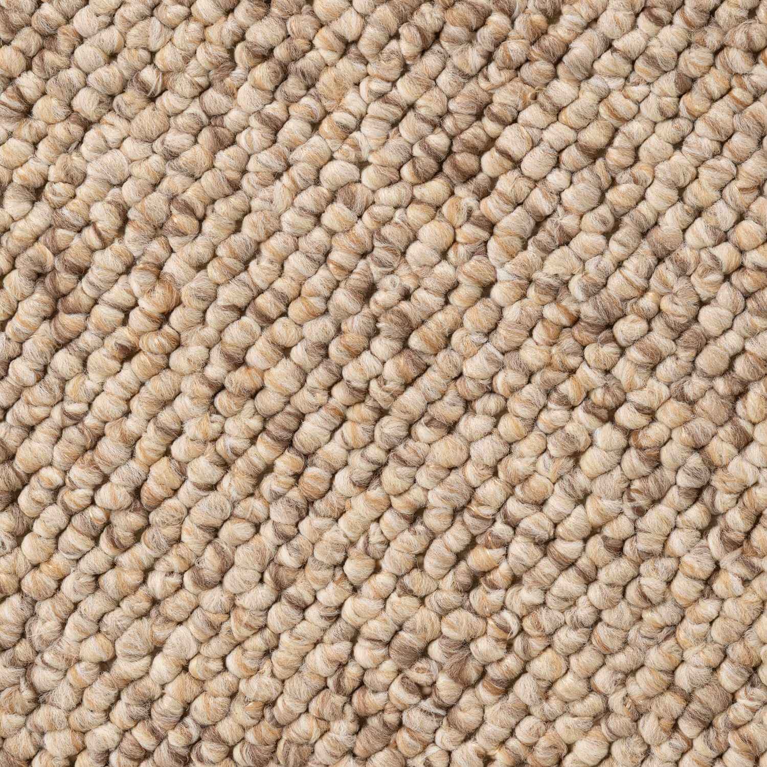 Close-up of beige textured carpet