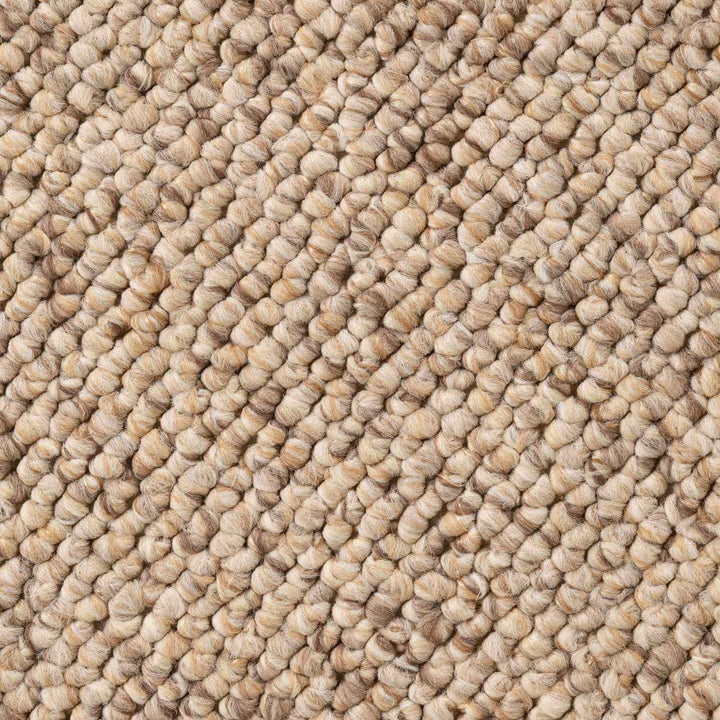 Close-up of beige textured carpet