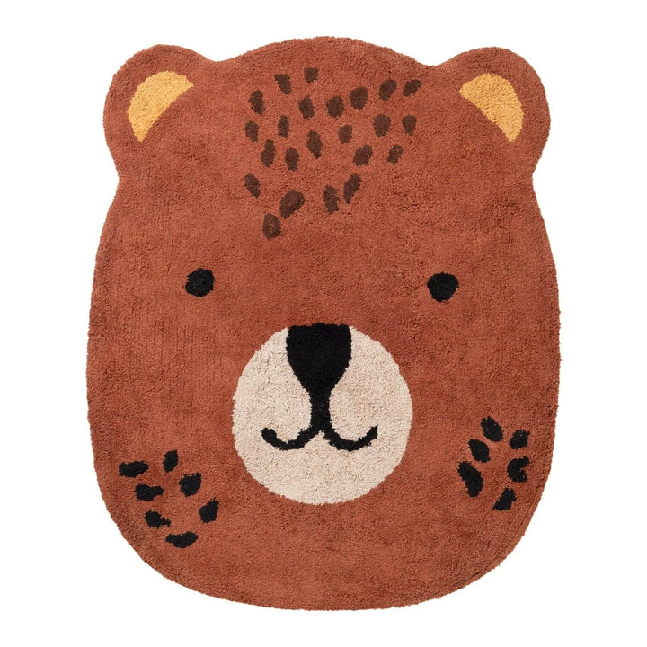 Bear-shaped rug with brown fur, black eyes, and a white muzzle on a white background