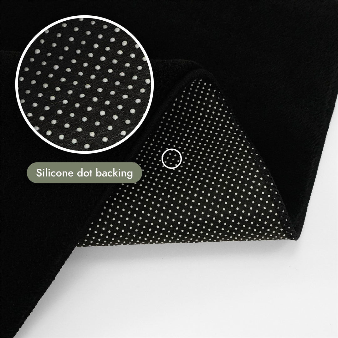 Washmellow black washable rug, silicone dot backing that grips hard floors | The Rugs