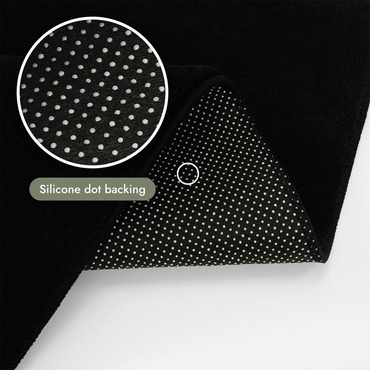 Washmellow black washable rug, silicone dot backing that grips hard floors | The Rugs