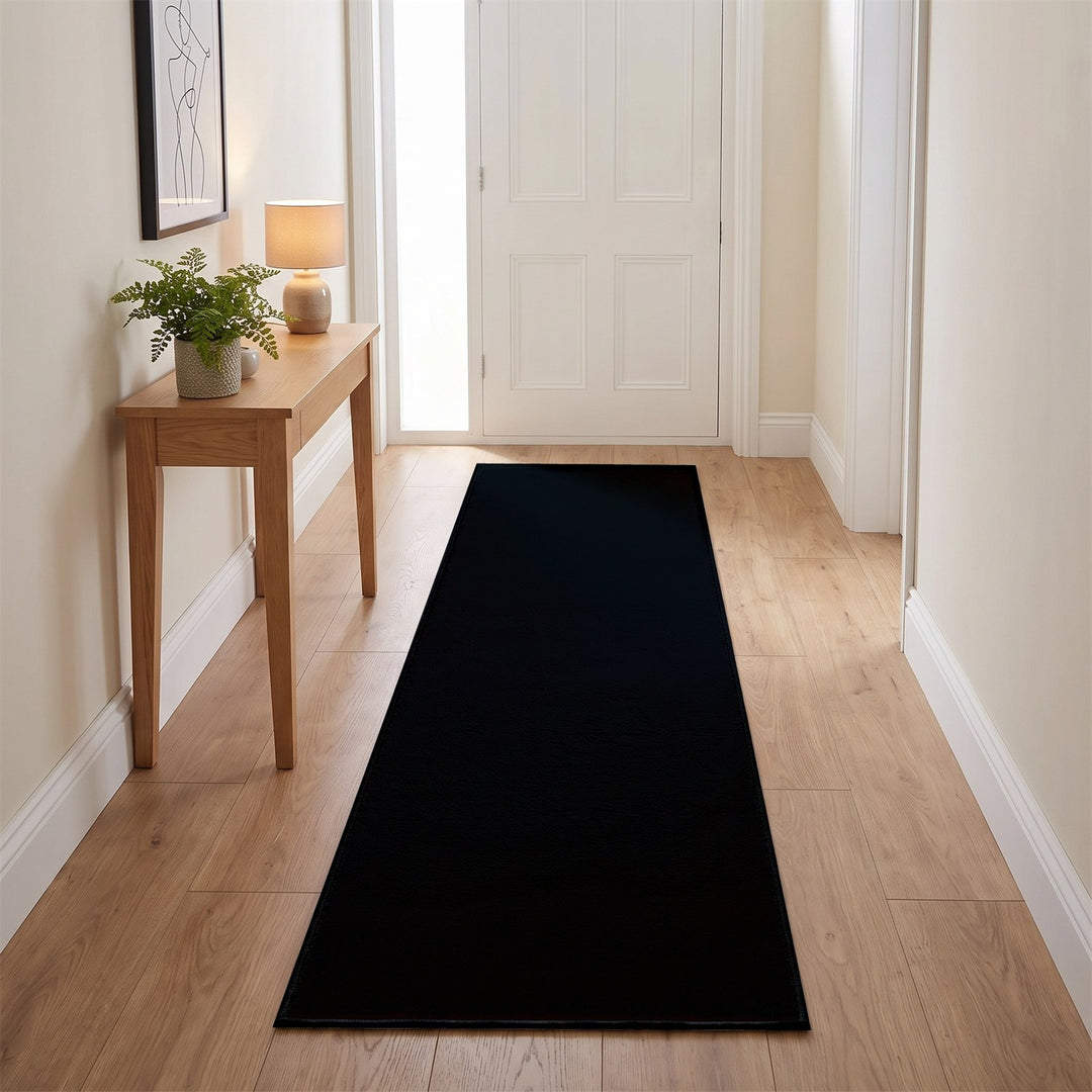 Washmellow black washable runner in a hallway | The Rugs