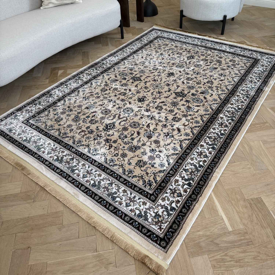 Decorative rug with intricate patterns on a wooden floor