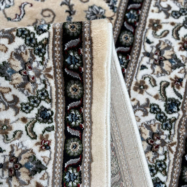 Close-up of a patterned rug with intricate designs.