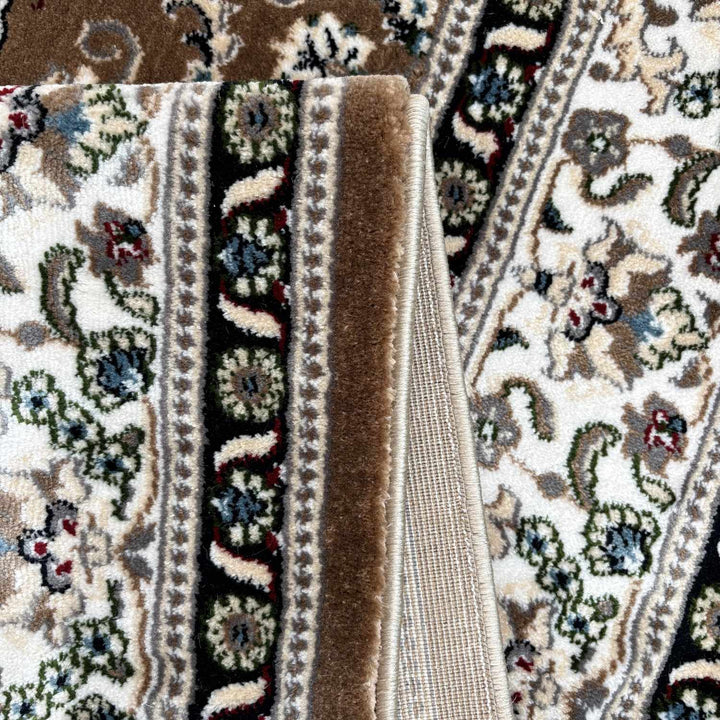 Close-up of a patterned rug with intricate designs.