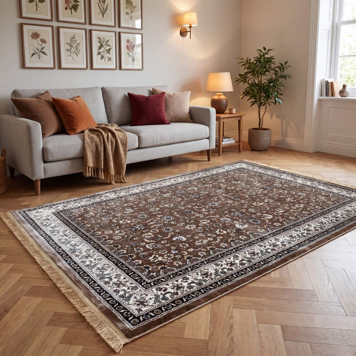 Living room with a patterned rug, sofa, and decorative elements.