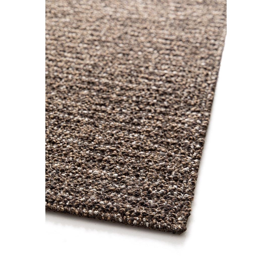 Dune Boucle brown textured rug, close-up of the bound edge | The Rugs