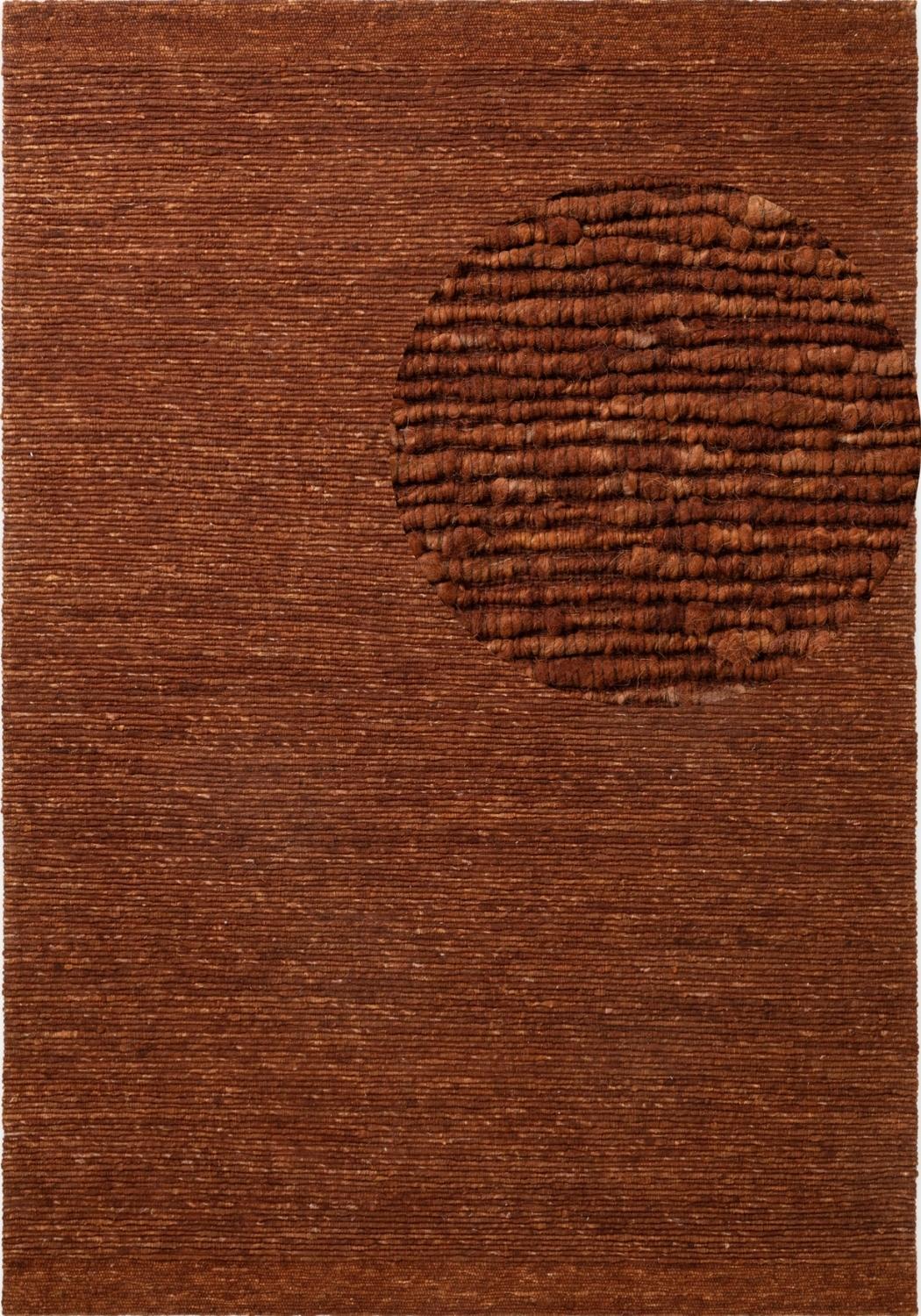 Brown textured rug with a circular pattern