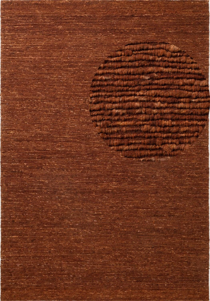 Brown textured rug with a circular pattern