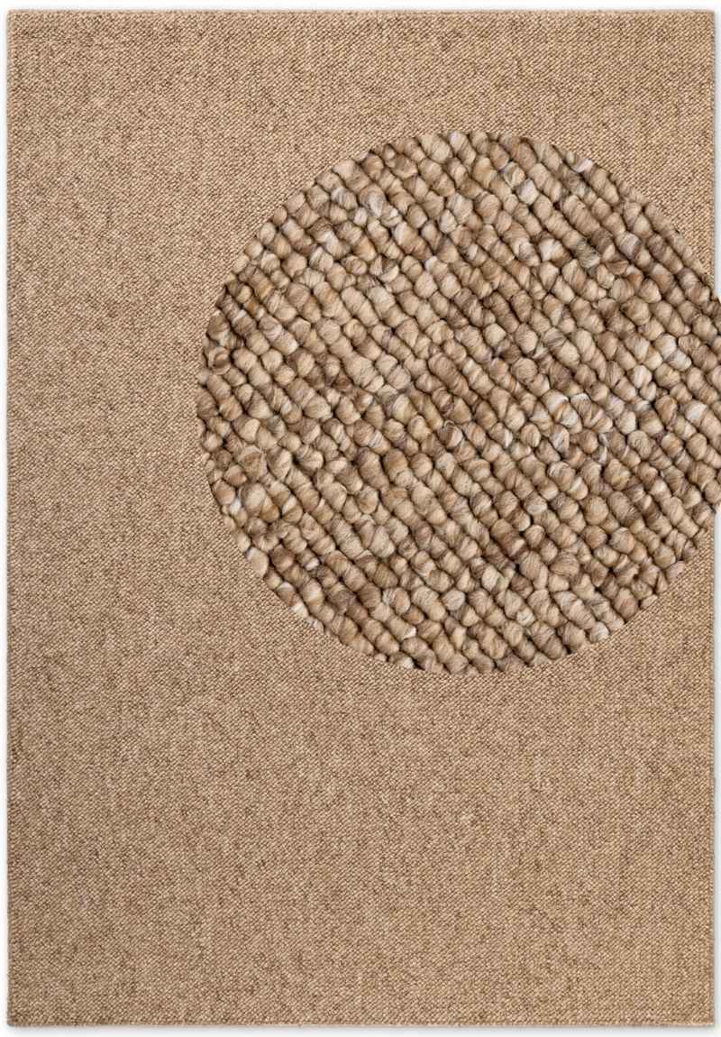 Beige rug with a textured circular design in the center
