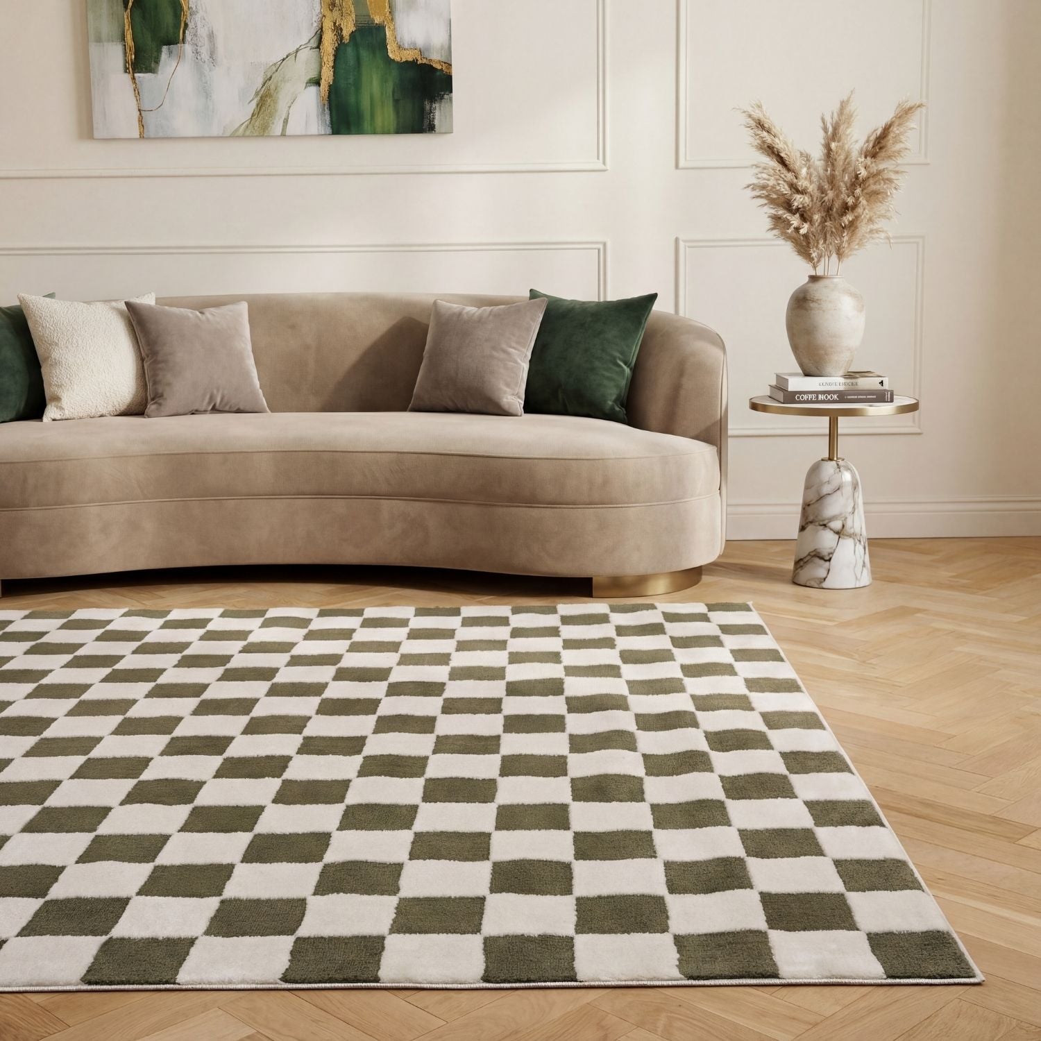 Living room with a beige sofa, checkered rug, and side table with decor items.