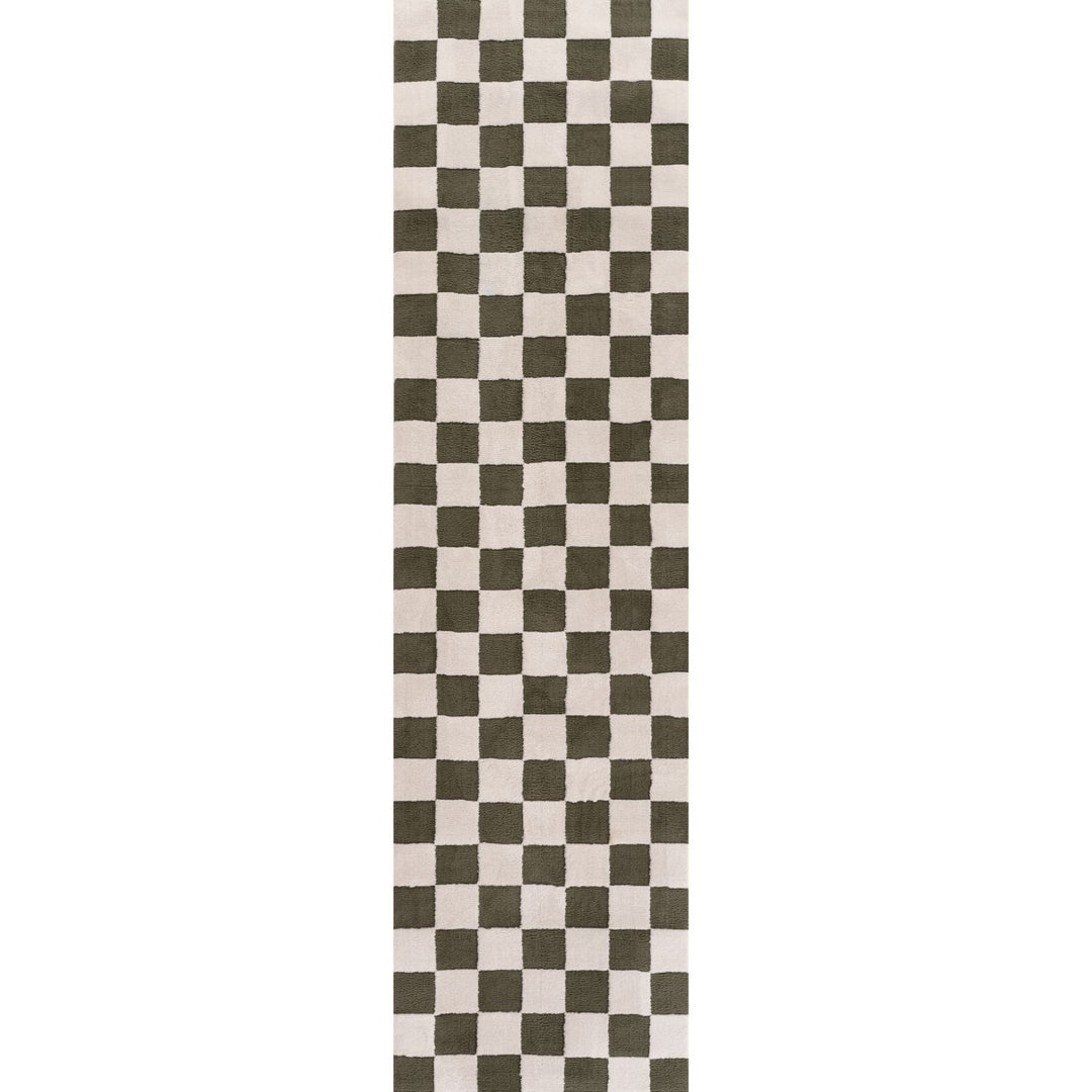 Checkered patterned rug with green and white squares on a plain background