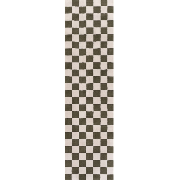 Checkered patterned rug with green and white squares on a plain background