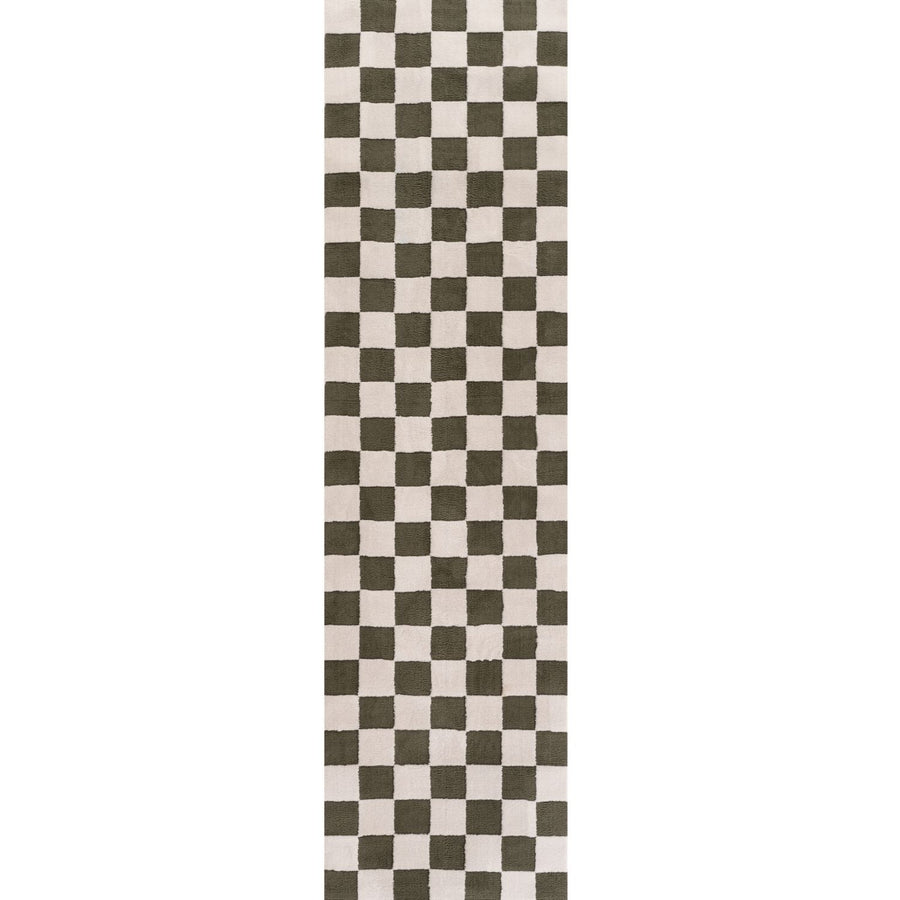 Checkered patterned rug with green and white squares on a plain background