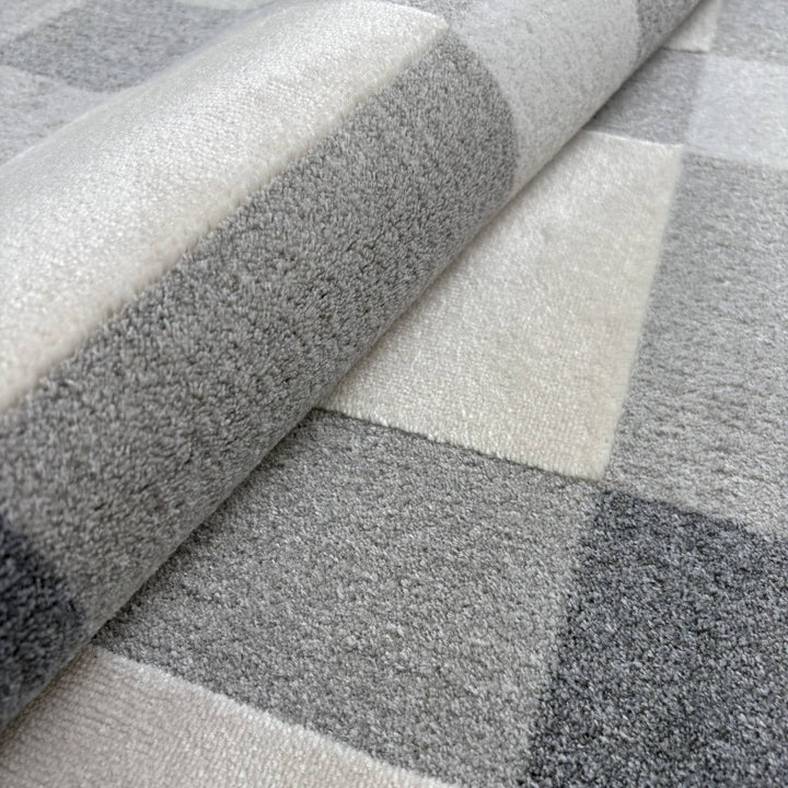 Gray and white checkered patterned carpet