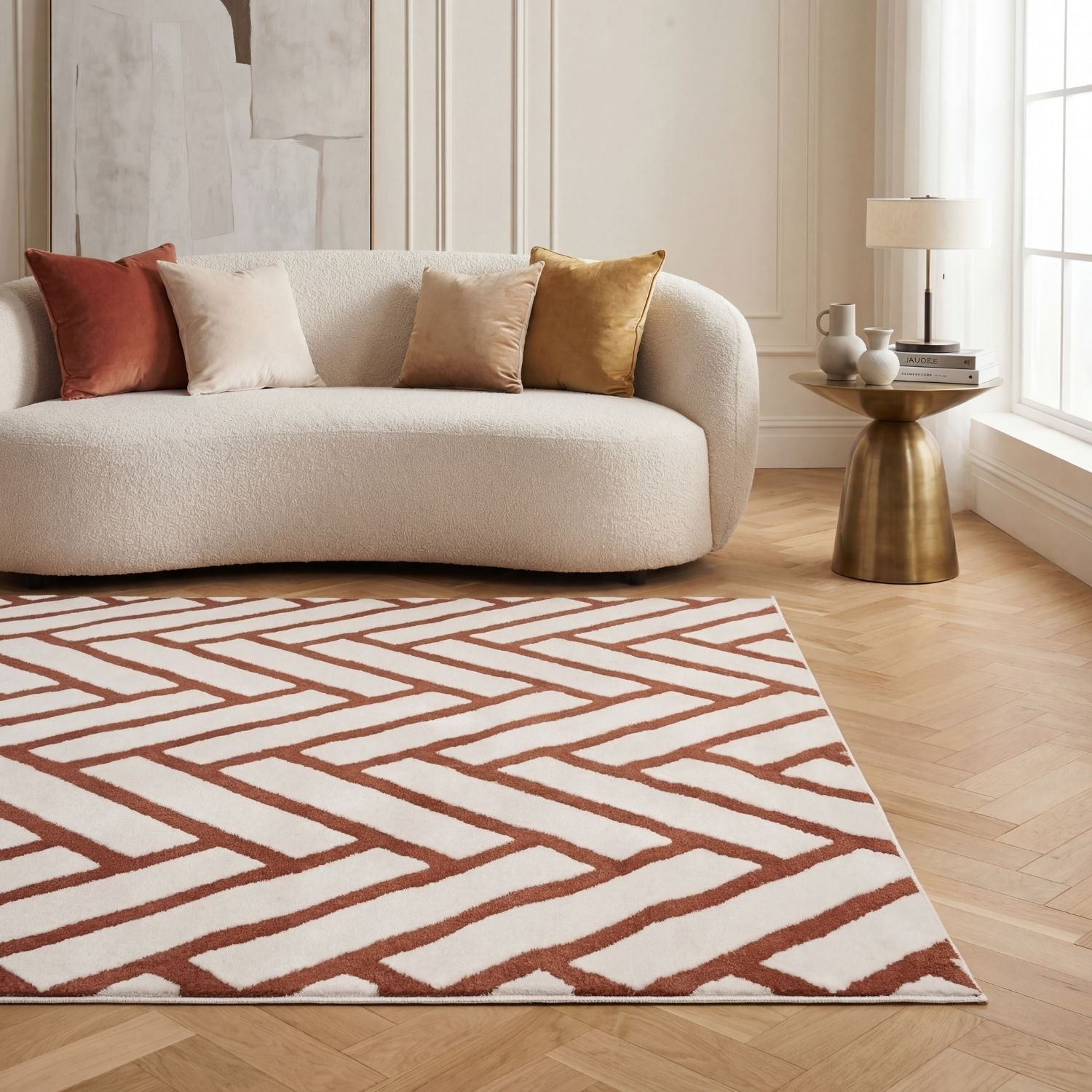 Modern living room with a patterned rug, sofa, and side table.