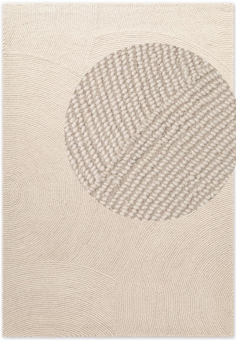 Textured rug with a circular pattern on a beige background
