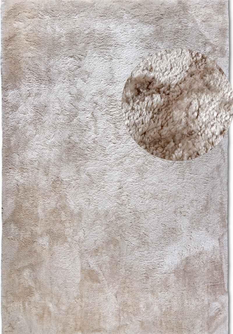 Textured beige rug with a circular pattern