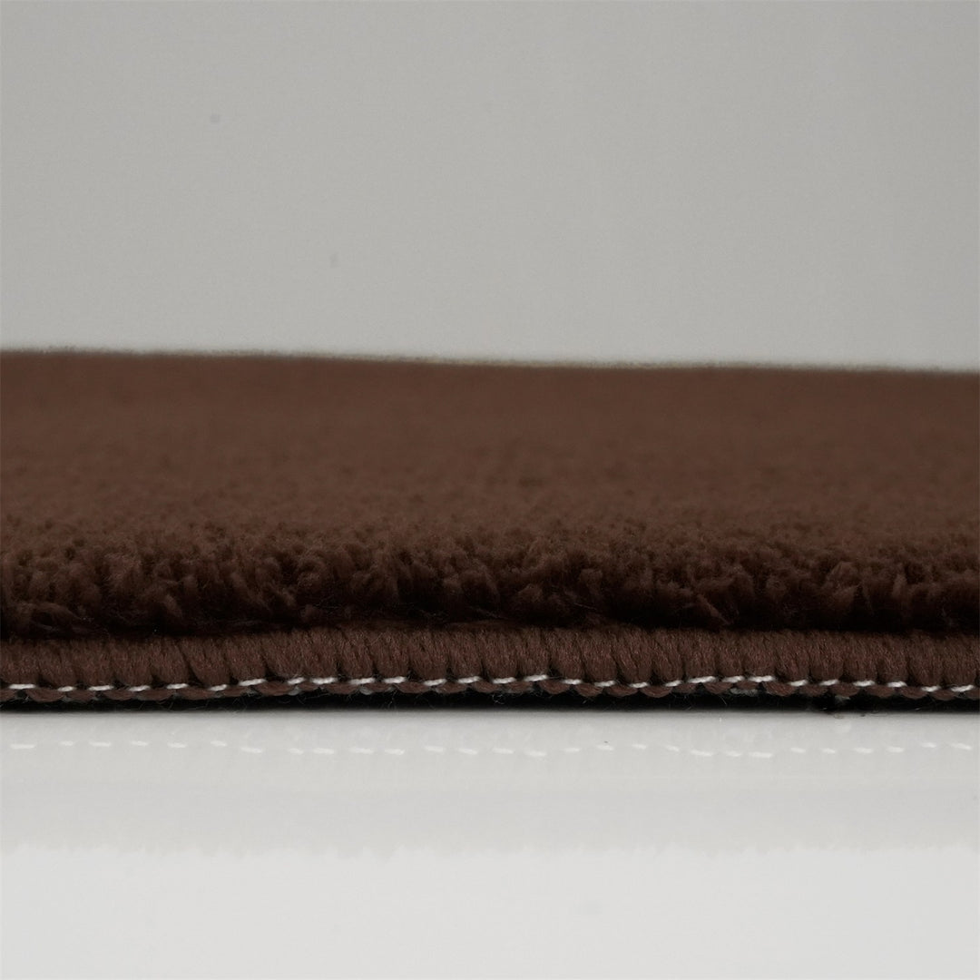 Washmellow dark brown washable rug, side view of the low pile and edge at floor level | The Rugs