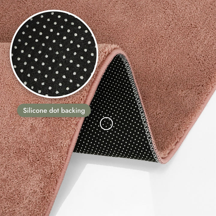 Washmellow dark pink washable rug, silicone dot backing that grips hard floors | The Rugs